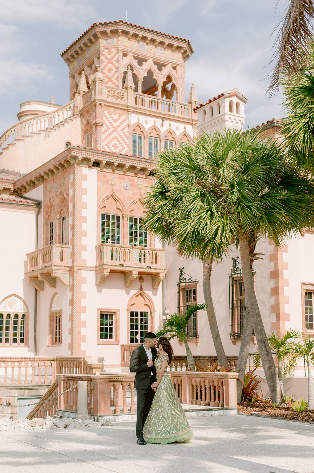 "Romantic engagement session at the John and Mable Ringling Museum features stunning Indian couple and breathtaking scen