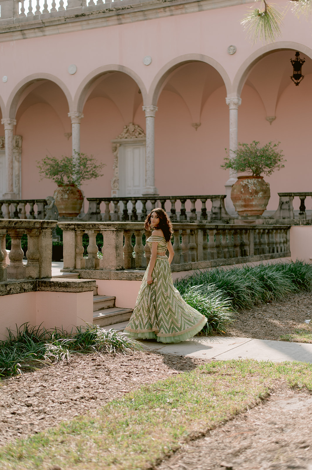 "Romantic engagement session with the Ringling Museum's Ca' d'Zan as a beautiful backdrop"
