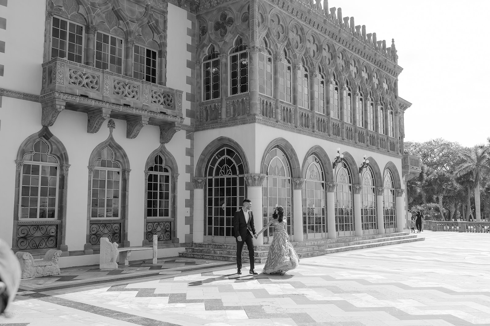 "Stunning engagement session at the John and Mable Ringling Museum with Indian couple in traditional attire"
