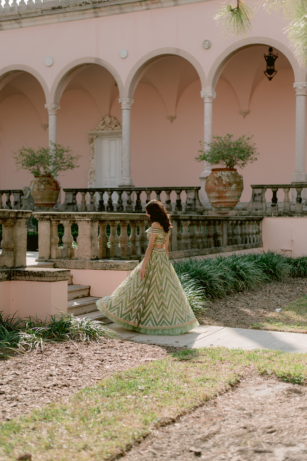 "Stunning portrait of Indian bride and groom at the Ringling Museum's Ca' d'Zan mansion"
