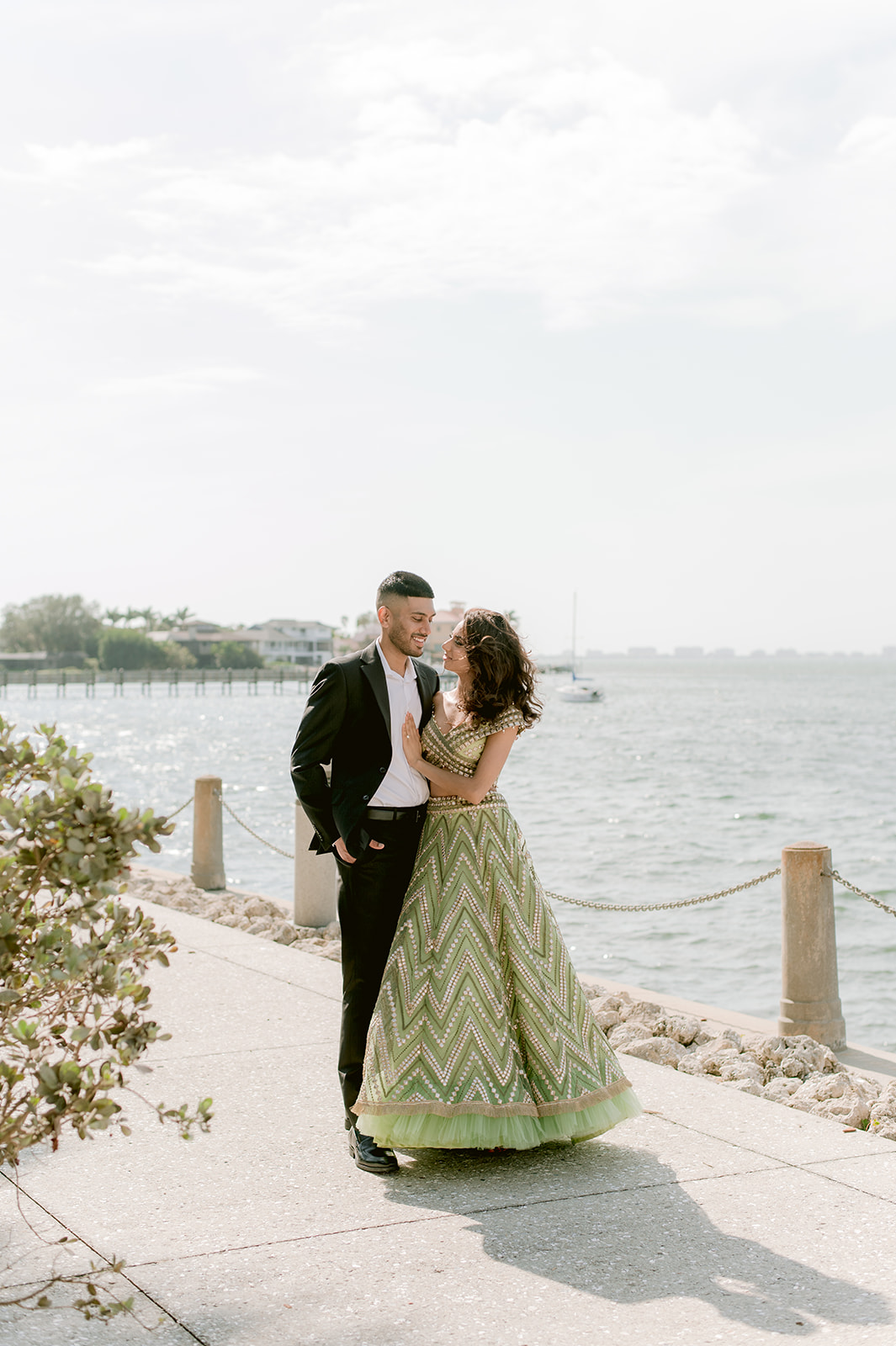 "Stunning Ringling Museum engagement session with beautiful Indian couple in traditional attire and romantic setting"
