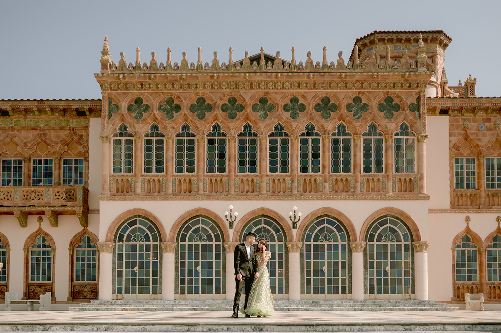 "Stunning Ringling Museum engagement session with beautiful Indian couple in traditional attire"
