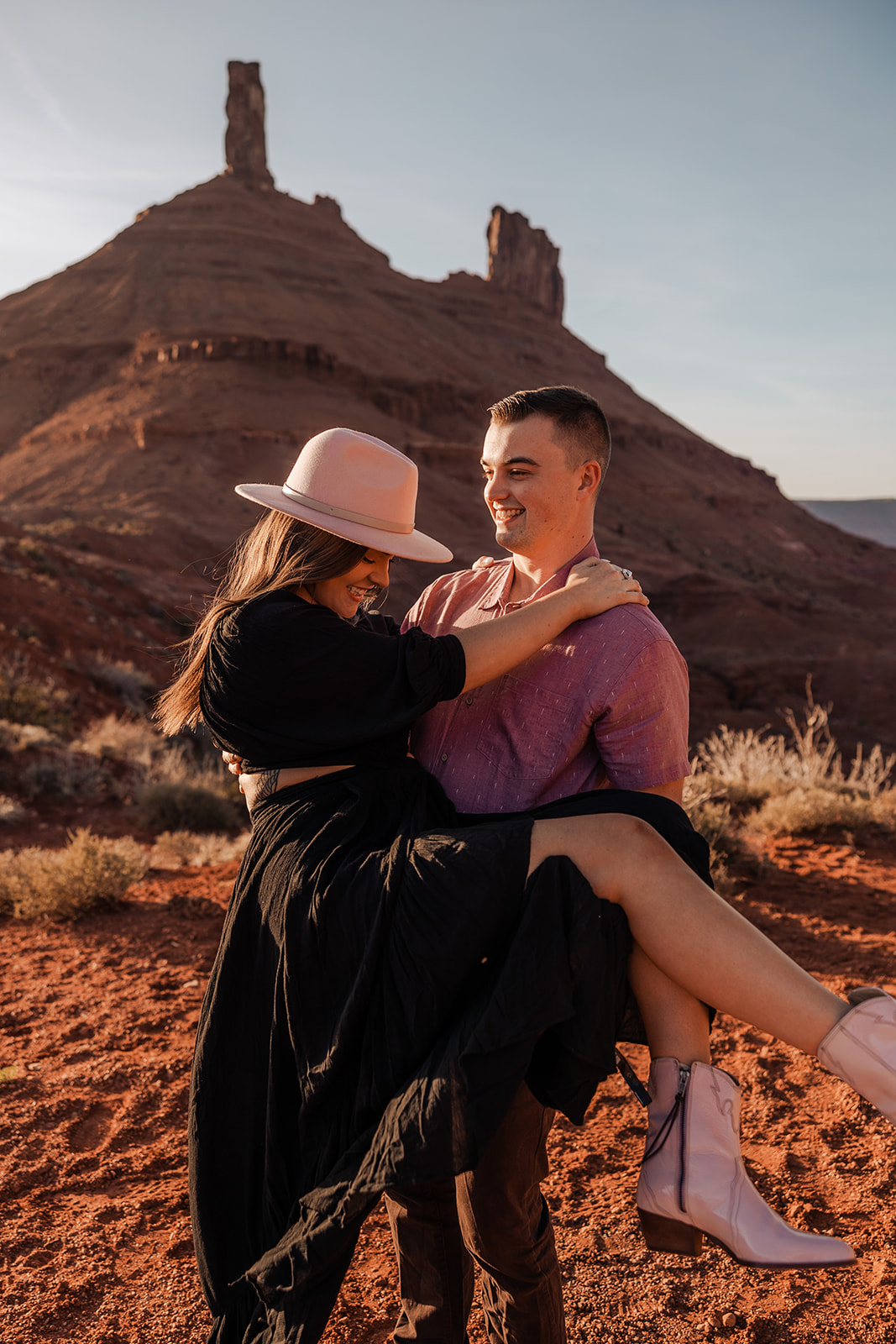 couple at sunset for their engagement portraits