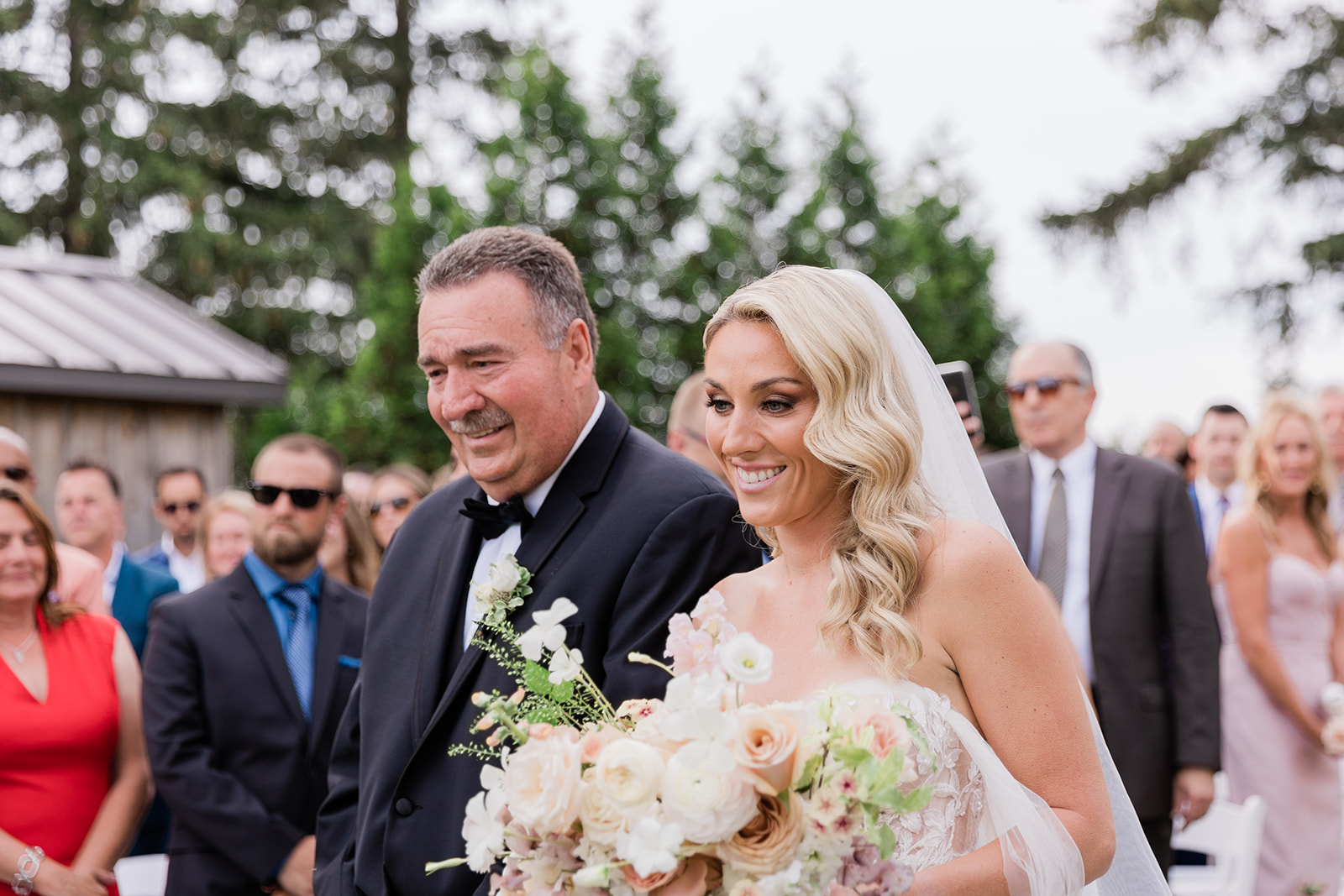 bride and father walking down the isle wedding ceremony at farm to table wedding by jess collins photography
