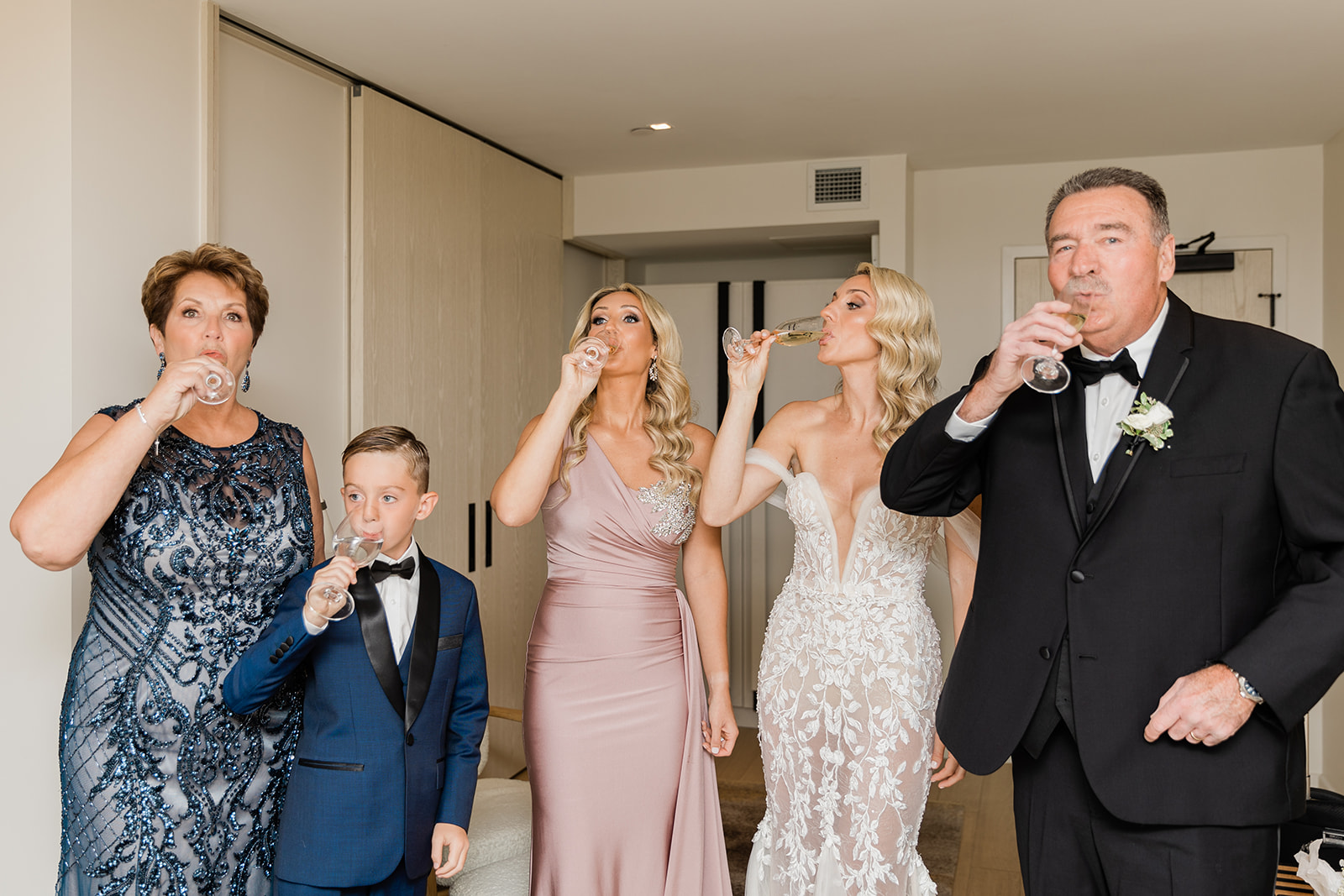 bride prep drinking champagne at farm to table wedding by jess collins photography
