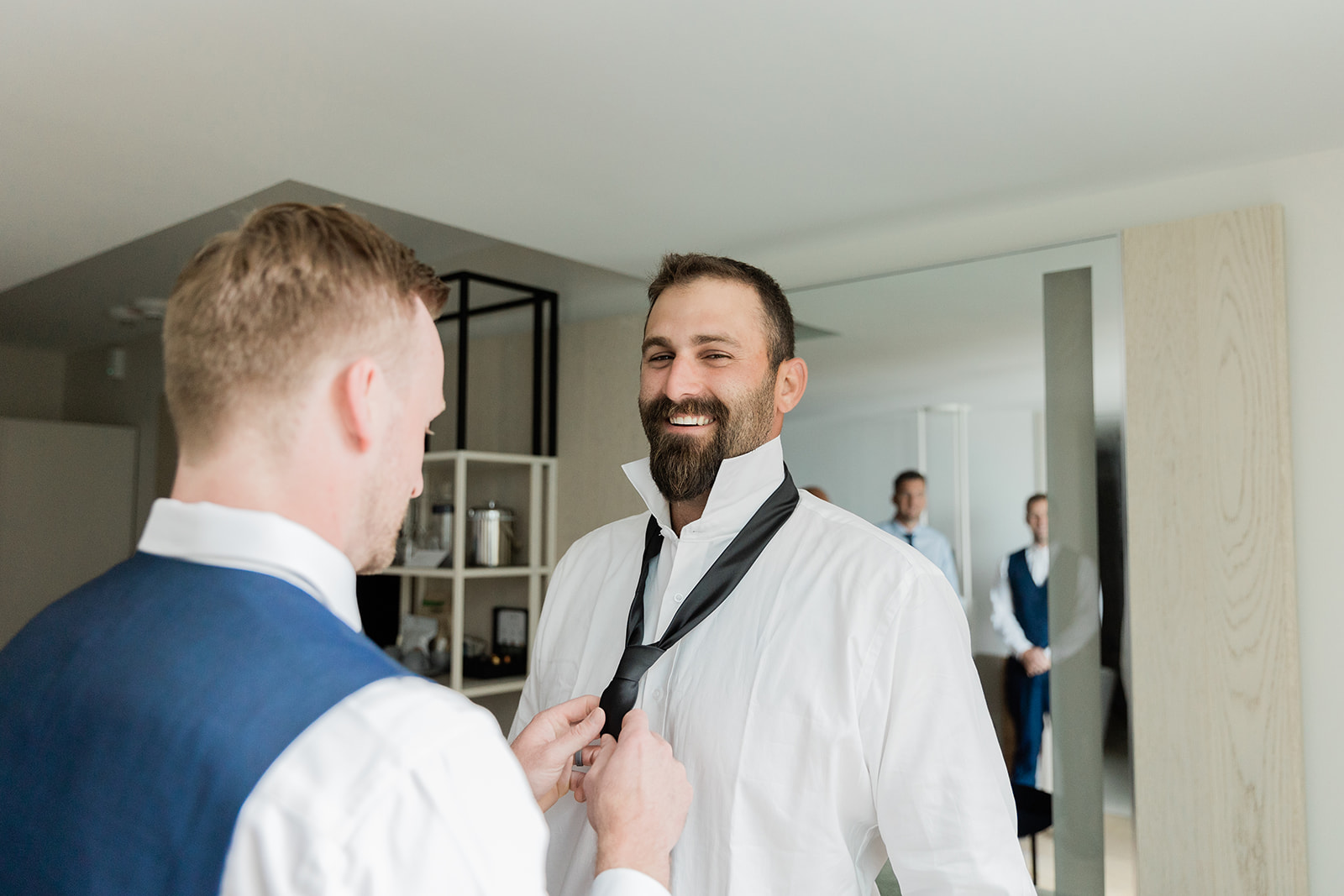 groom prep tie at farm to table wedding by jess collins photography