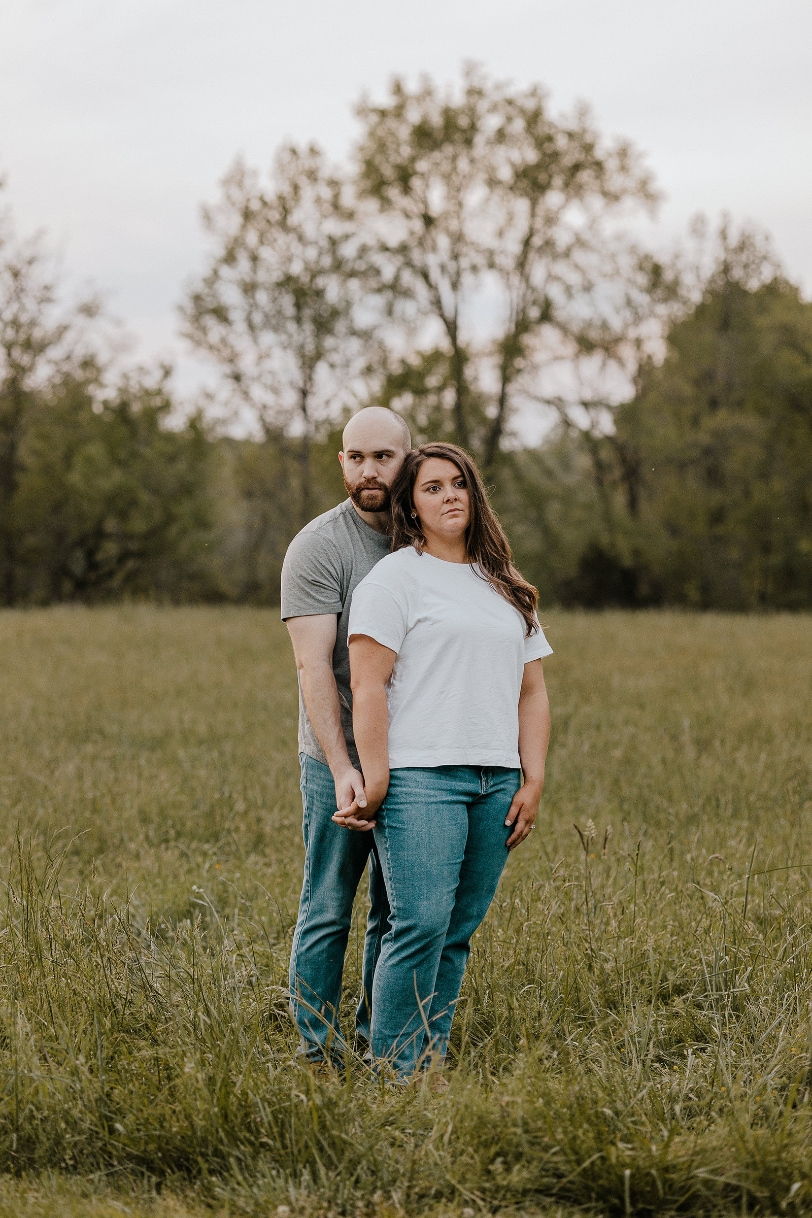 A engaged couple at Fisher Farm Park In Davidson NC