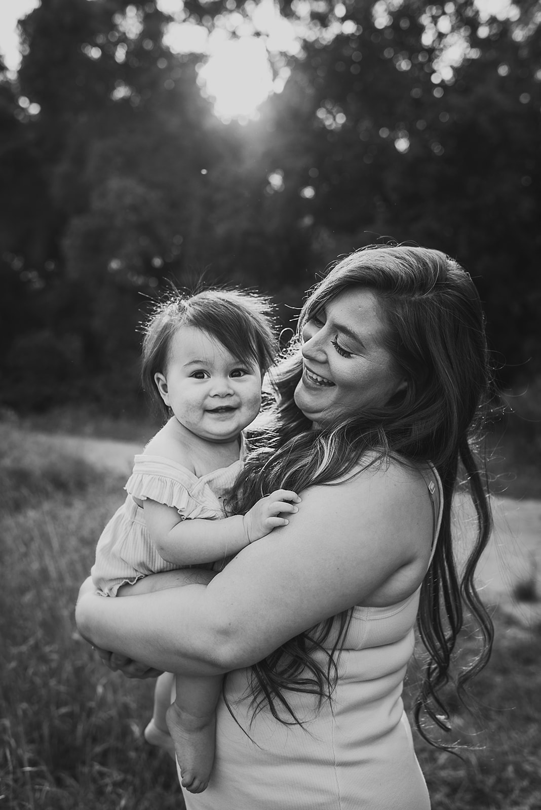 A gorgeous black and white photo of mom and her baby in San Diego
