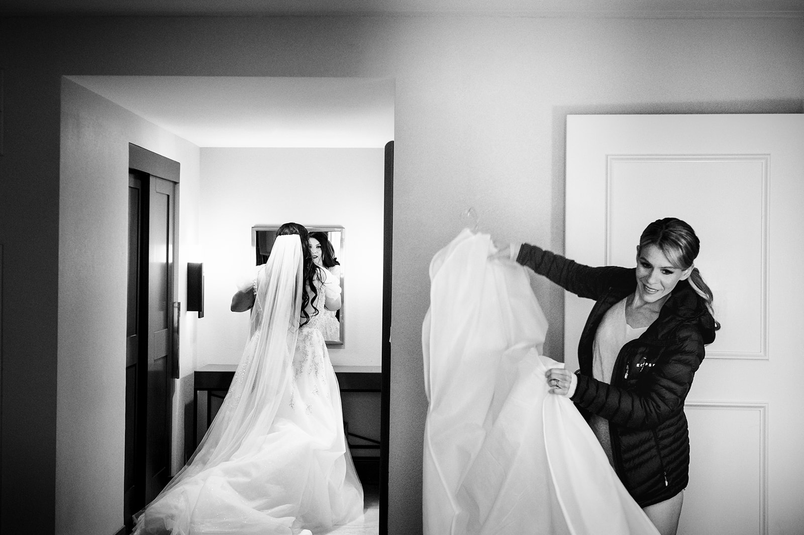 BW photo of two brides getting ready together in Las Vegas