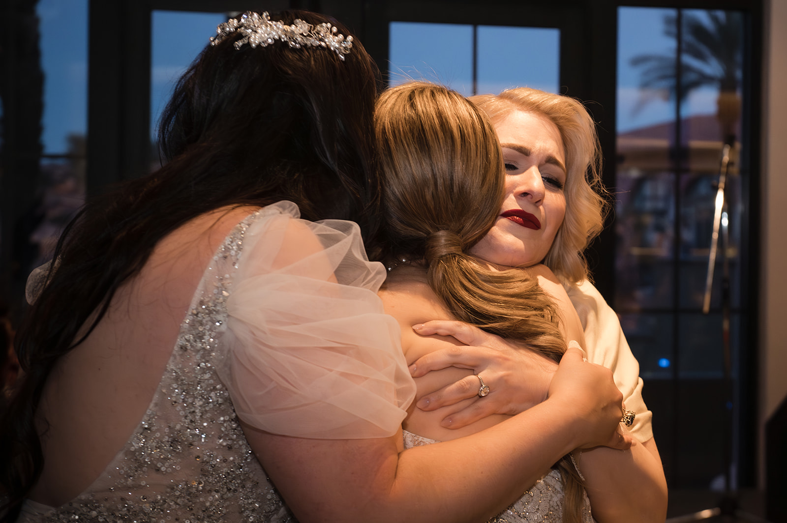Two brides in storytelling emotional photo at their wedding in Las Vegas