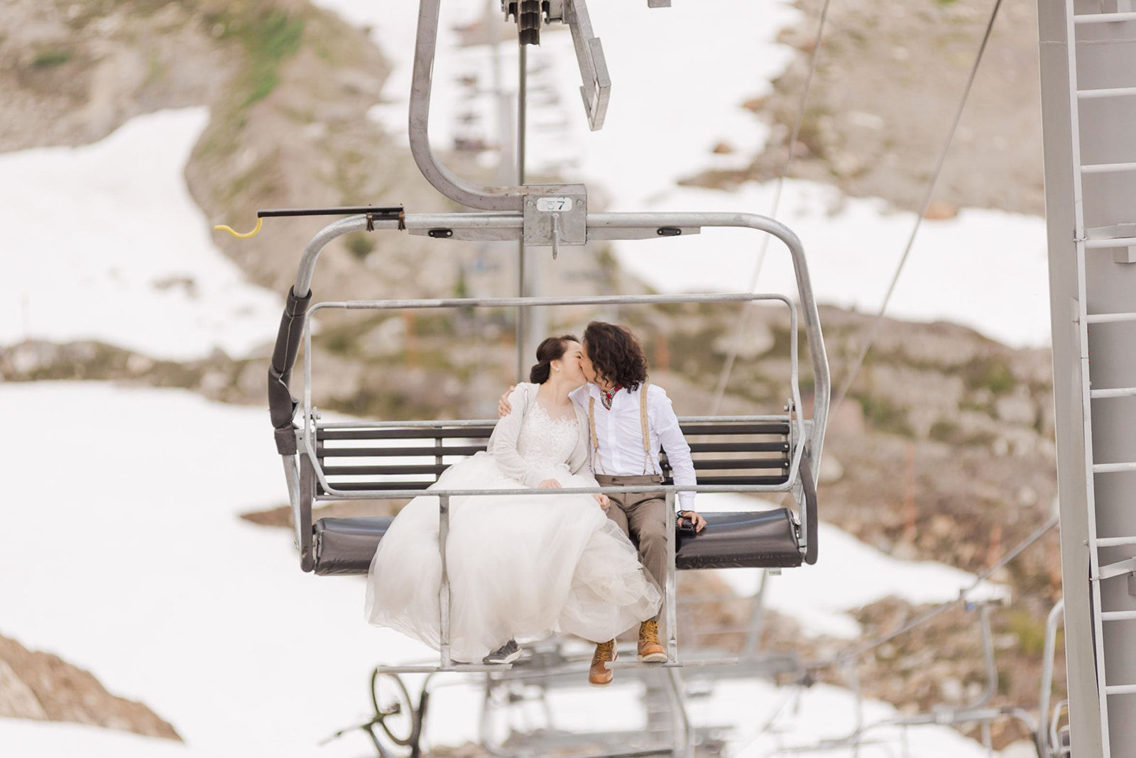 chair lift ride during whistler adventure engagement session