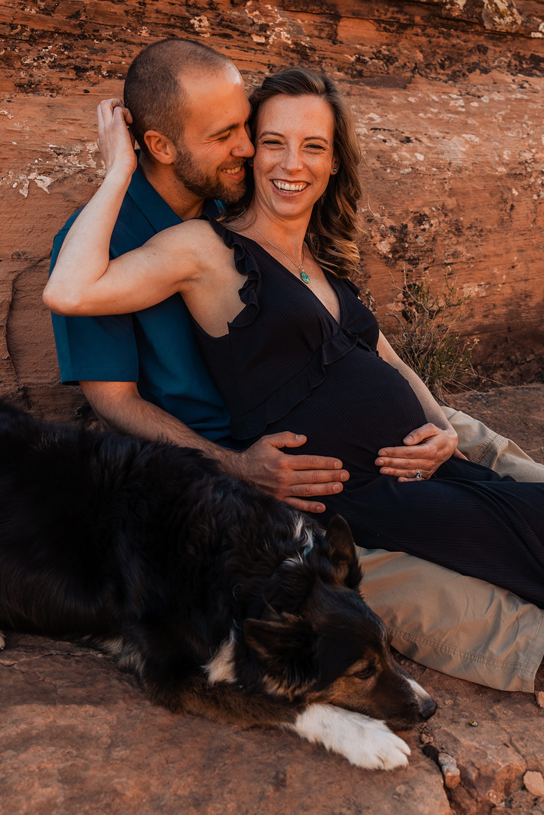 couple hikes near arches national park for maternity portraits in moab
